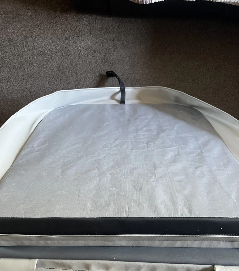 Cover underside showing heat sealed vapour barrier