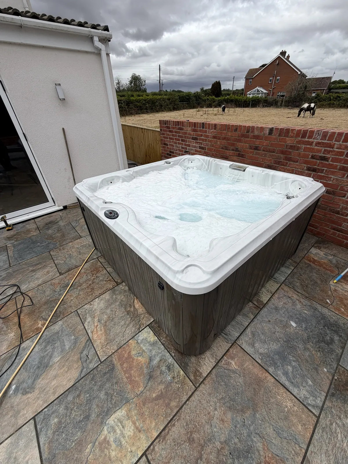 Newly commissioned hot tub with the jets running