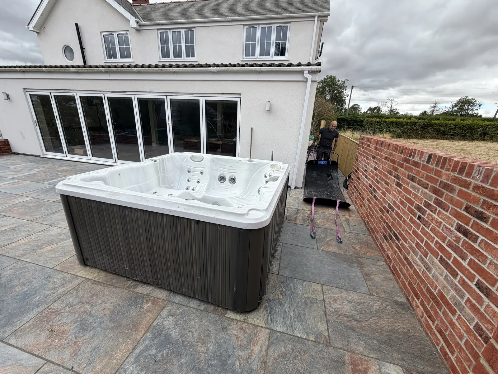 Hot tub installed on a slate patio in Lincolnshire