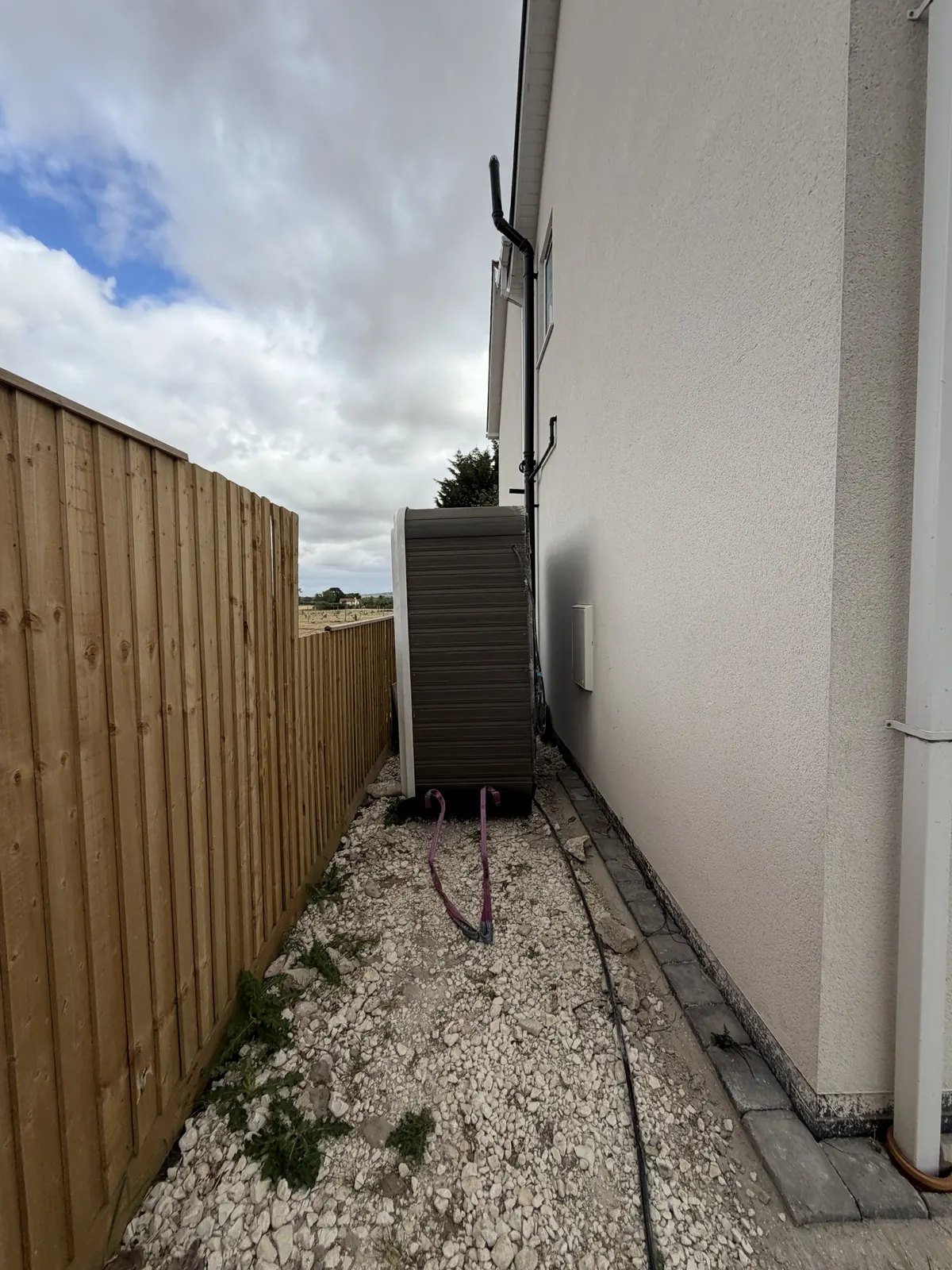 Hot tub moved on end down a narrow side passage